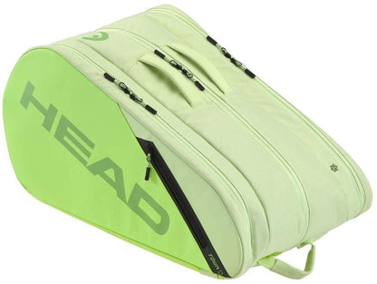 The HEAD Tour Padel Racket Bag L - SG features a light green design with two main zippered compartments, a side pocket, and top carrying handles. The bold HEAD logo adds style, making it ideal for padel players.