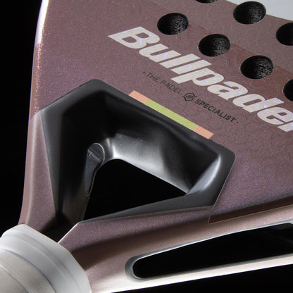 Close-up of the Bullpadel Wonder 2026 Padel Racket by Bullpadel, showing its textured maroon throat, black triangular hole, Hyper Core design, and "THE PADEL SPECIALIST" branding above the handle.