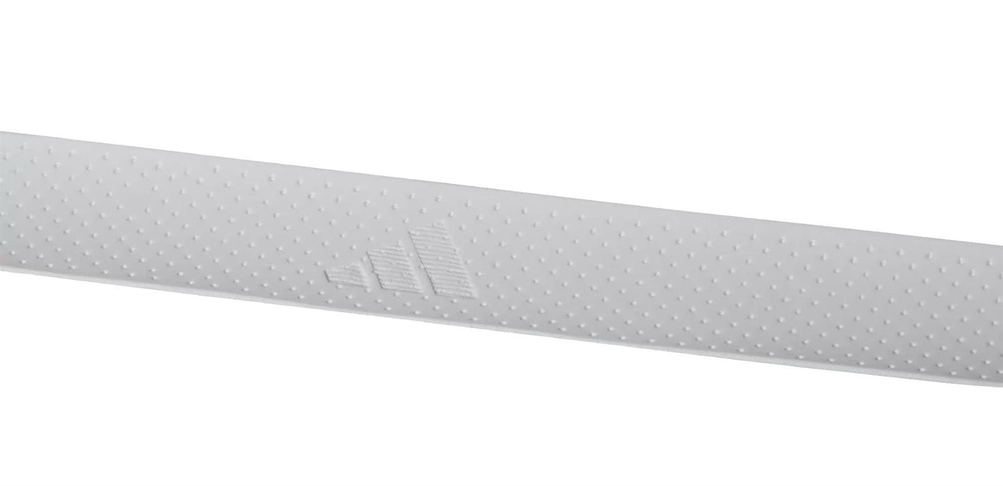 A close-up of a white adidas Padel Overgrips (3 Pack) strip, featuring small bumps, micro-perforations, and an embossed triangle logo for comfort and performance, shown against a plain white background.