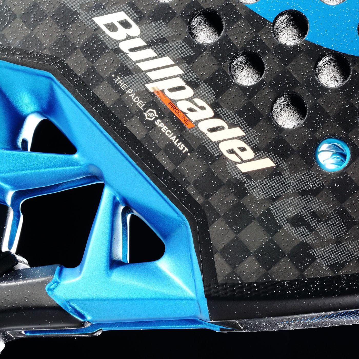 Close-up of the Bullpadel Vertex 05 Hybrid 2026 Padel Racket, featuring a carbon fiber texture, blue accents, and Bullpadel branding. The hybrid shape stands out against a sleek black background.