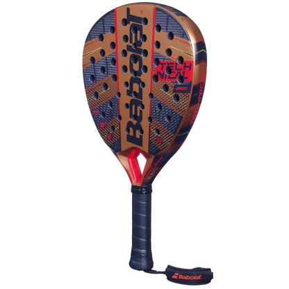 The Babolat Technical Veron Padel Racket features a teardrop shape for power and precision, a carbon flex face in black and gold with red accents, plus a black handle and "Babolat"-labeled wrist strap.