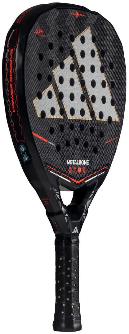 The adidas Metalbone by Ale Galán 2026 Padel Racket is black with a large white logo, red accents, and a perforated surface. It has a Spin Blade Decal for better spin and a customizable weight and balance system.