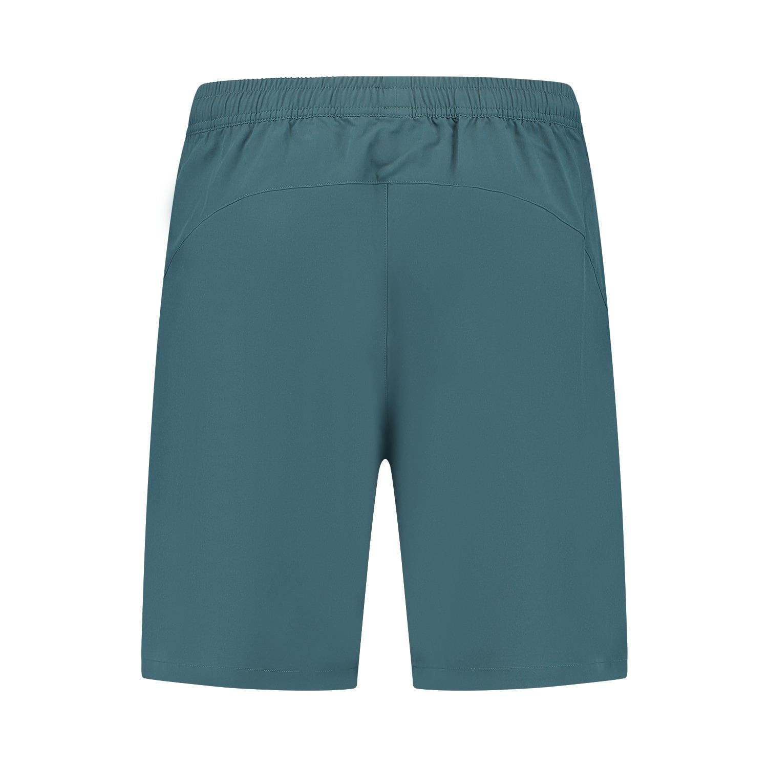 Back view of elastic waistband teal shorts, crafted from four-way stretch polyester, offering a smooth and lightweight feel ideal for sports or exercise activities like wearing K-Swiss Hypercourt 7" Men's Padel Shorts 2 - Stargazer during a match.