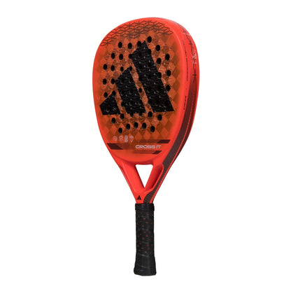 The ADIDAS Cross It Padel Racket by adidas is a red and black professional racket designed for power and spin.