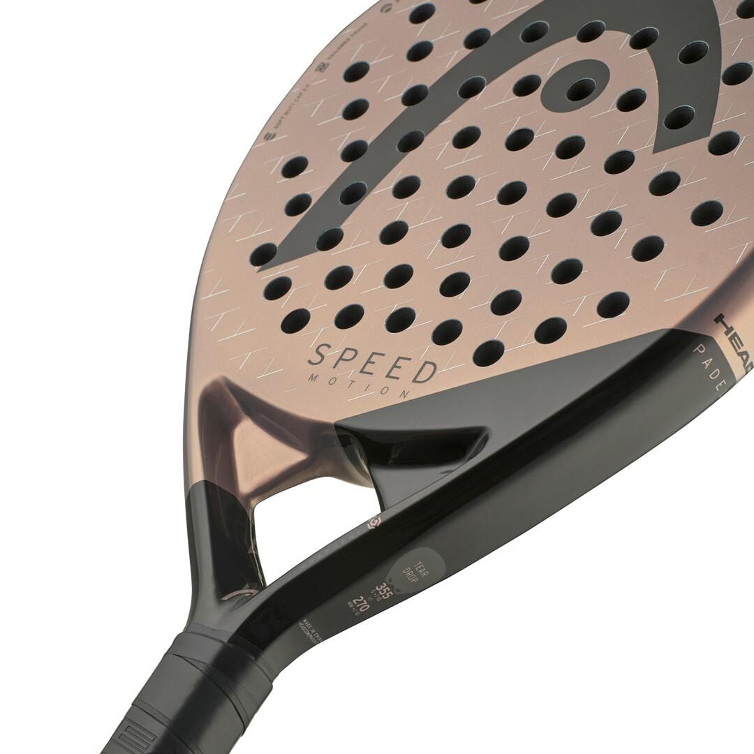 Close-up of the HEAD Speed Motion 2025 Padel Racket, featuring a metallic bronze face with "SPEED" print and perforations. It boasts Auxetic 2.0 technology, plus a black handle and frame with sleek, angular design details.