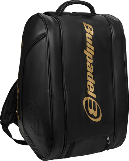 The Bullpadel BPP26006 Flow 2026 Padel Racket Bag in black features gold branding, a top handle, zippered compartments, padded straps, and thermal racket pockets inspired by the Flow 2026 design.