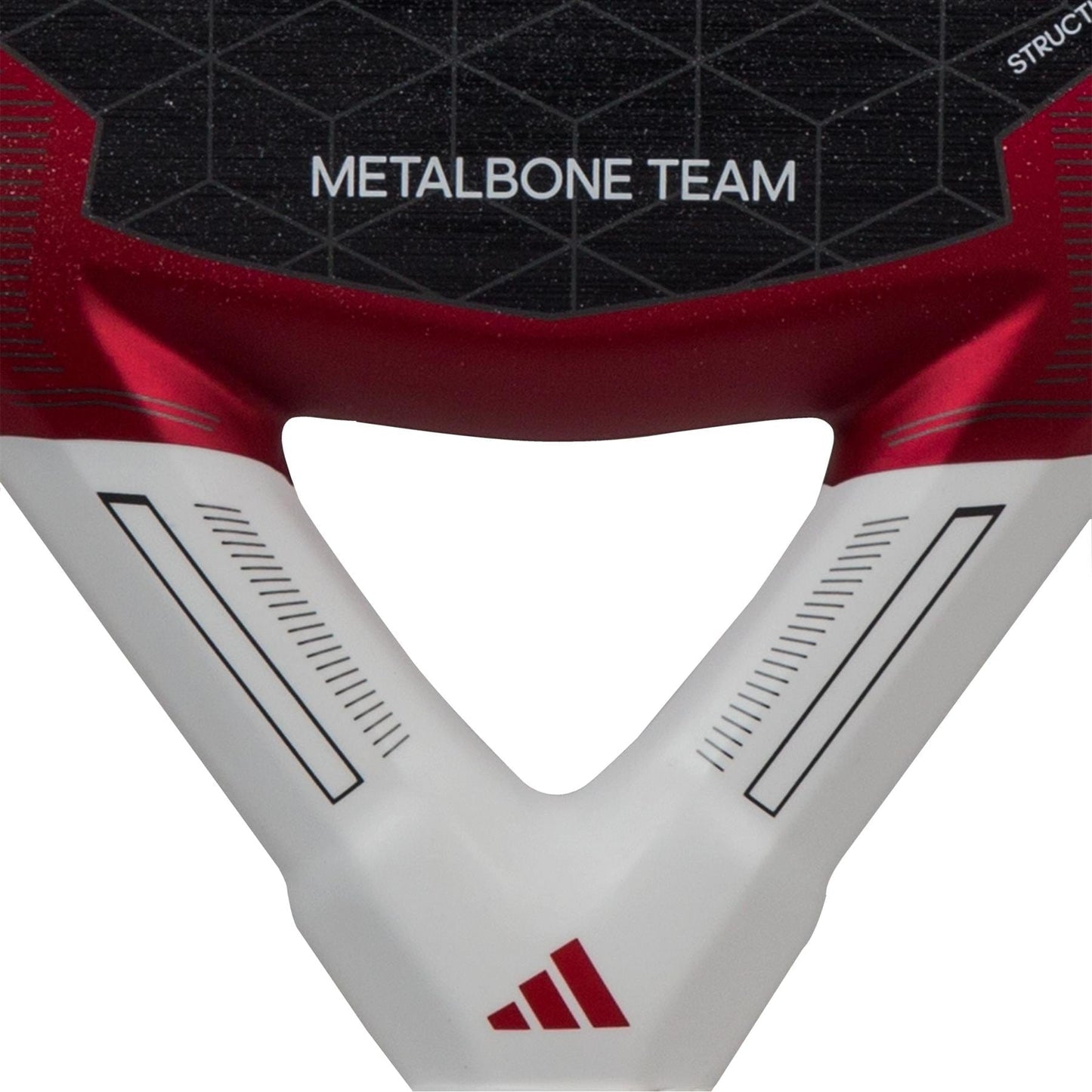 Close-up of the adidas Metalbone Team 3.3 Padel Racket, displaying "METALBONE TEAM" on a black-red background with a geometric pattern, Spin Blade Grit tech, and the red adidas logo on the white lower section.