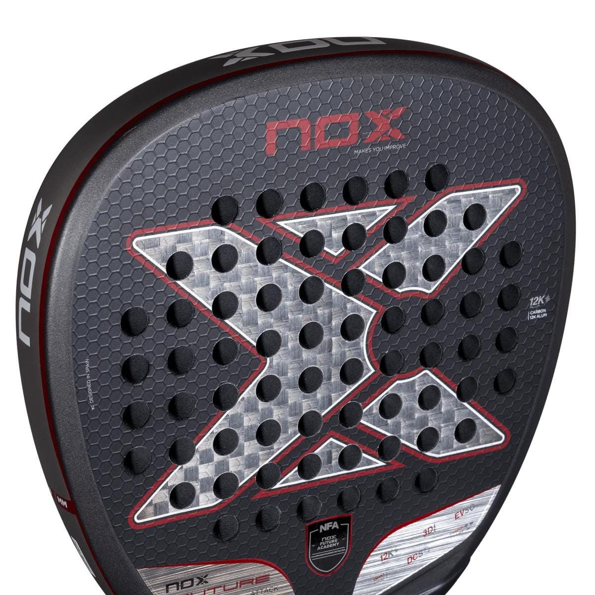 Close-up of the NOX NFA Future Attack 12K Alum Padel Racket by NOX, featuring a striking black and silver hexagonal pattern with red accents, a bold central “X,” and multiple round holes for a dynamic, powerful design.