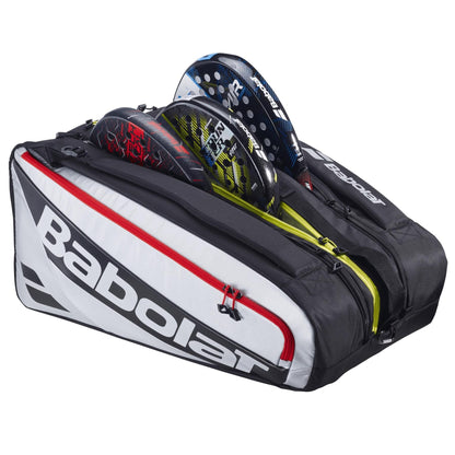 The Babolat RH Pro Padel Racket Bag - Black / Silver features large capacity with three padel rackets partially visible in separate compartments, plus an insulated racket compartment to protect your gear.