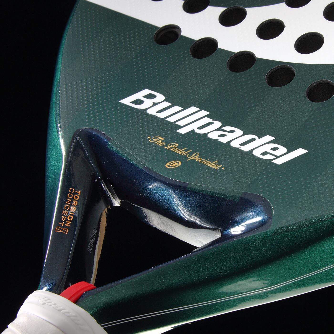 Close-up of the Bullpadel Icon 2026 Padel Racket in green and white, featuring the brand name, carbon fiber texture, a triangular frame by the handle, and design for performance inspired by Juan Martín Díaz.