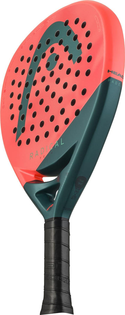 A close-up of the HEAD Radical Team 2026 Padel Racket, ideal for intermediate to advanced players, shows its red face with black perforations, bold HEAD logo, dark green edge and handle, and black grip tape.
