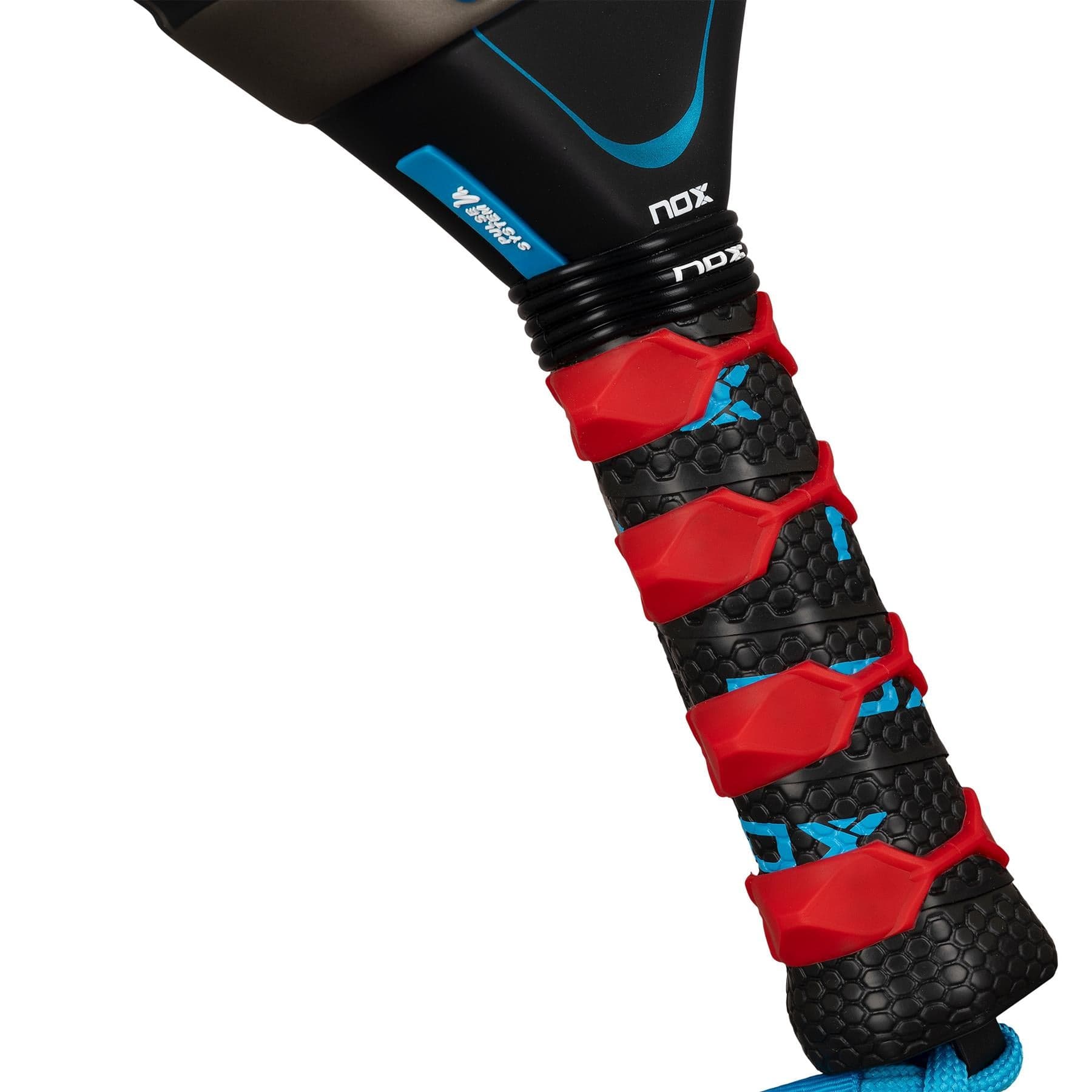 Close-up of the NOX AT10 Pro Cup Soft By Agustín Tapia 2026 padel racket handle, featuring a textured grip, red bands, blue details, clear NOX branding, and a wrist strap—created in collaboration with Agustín Tapia.