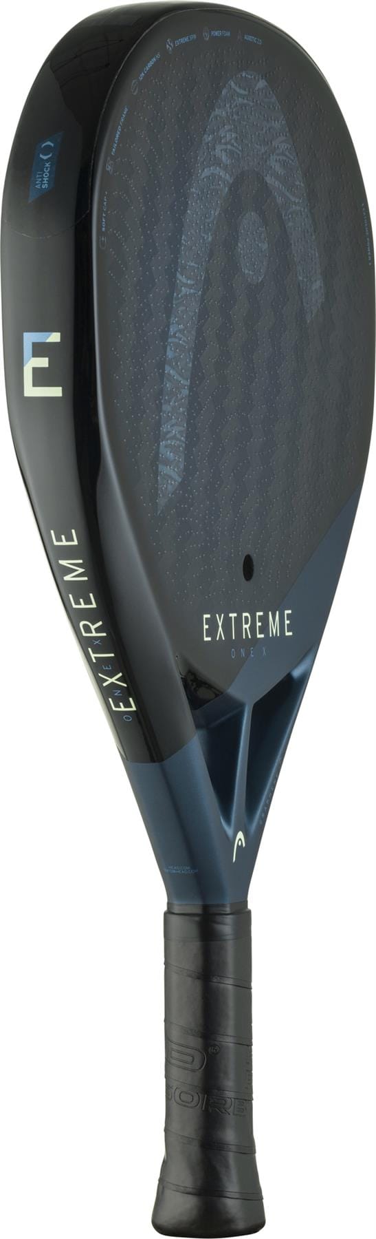 The HEAD Extreme One X 2025 Padel Racket by HEAD comes in black and dark blue, with "EXTREME" and "E" on the side, a textured 12K Carbon Fibre surface, Power Foam core, and a comfortable grip handle.