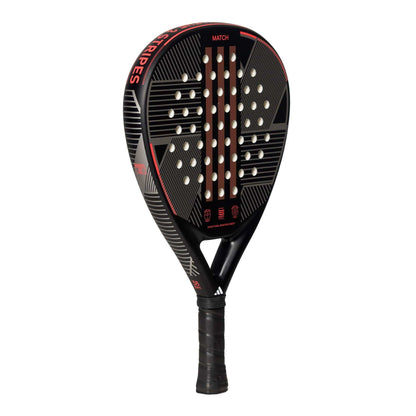 The adidas Match 3.3 Black / Red Padel Racket features a teardrop shape, geometric line patterns, white circular holes, and a wrapped handle—making it an ideal choice for beginners.
