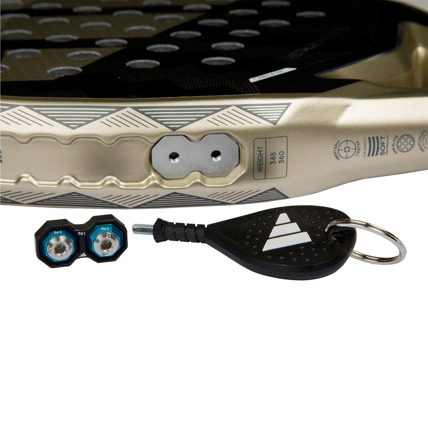 Close-up of the adidas Metalbone CTRL 3.4 Padel Racket frame, showing the Weight and Balance System with two removable weights and a black key-shaped tool with keyring next to the racket.