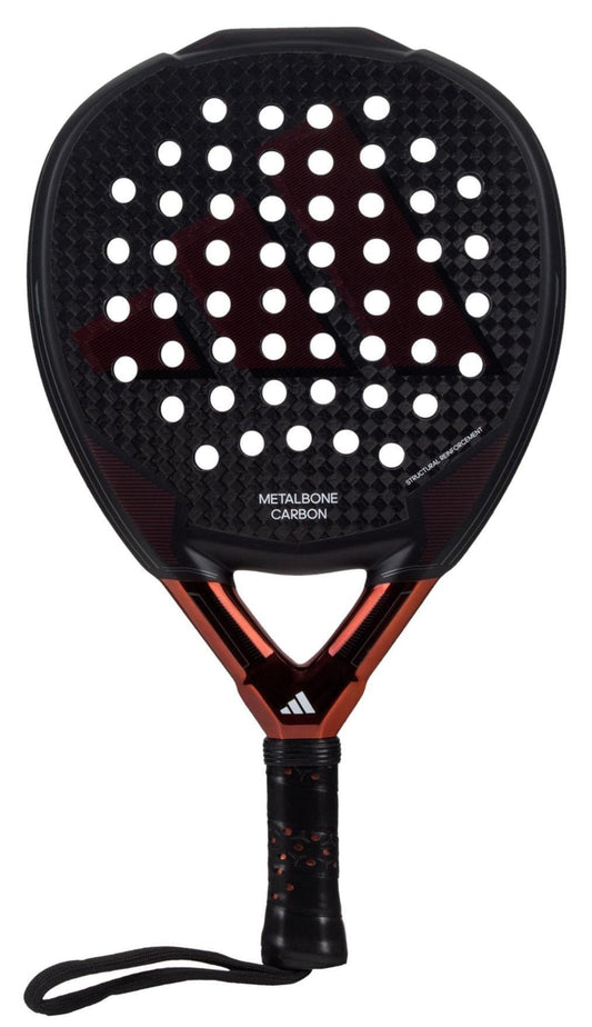 The adidas Metalbone Carbon 3.3 padel racket features a black and red design, perforated face, textured handle, wrist strap, and the adidas logo—ideal for advanced players seeking high performance.