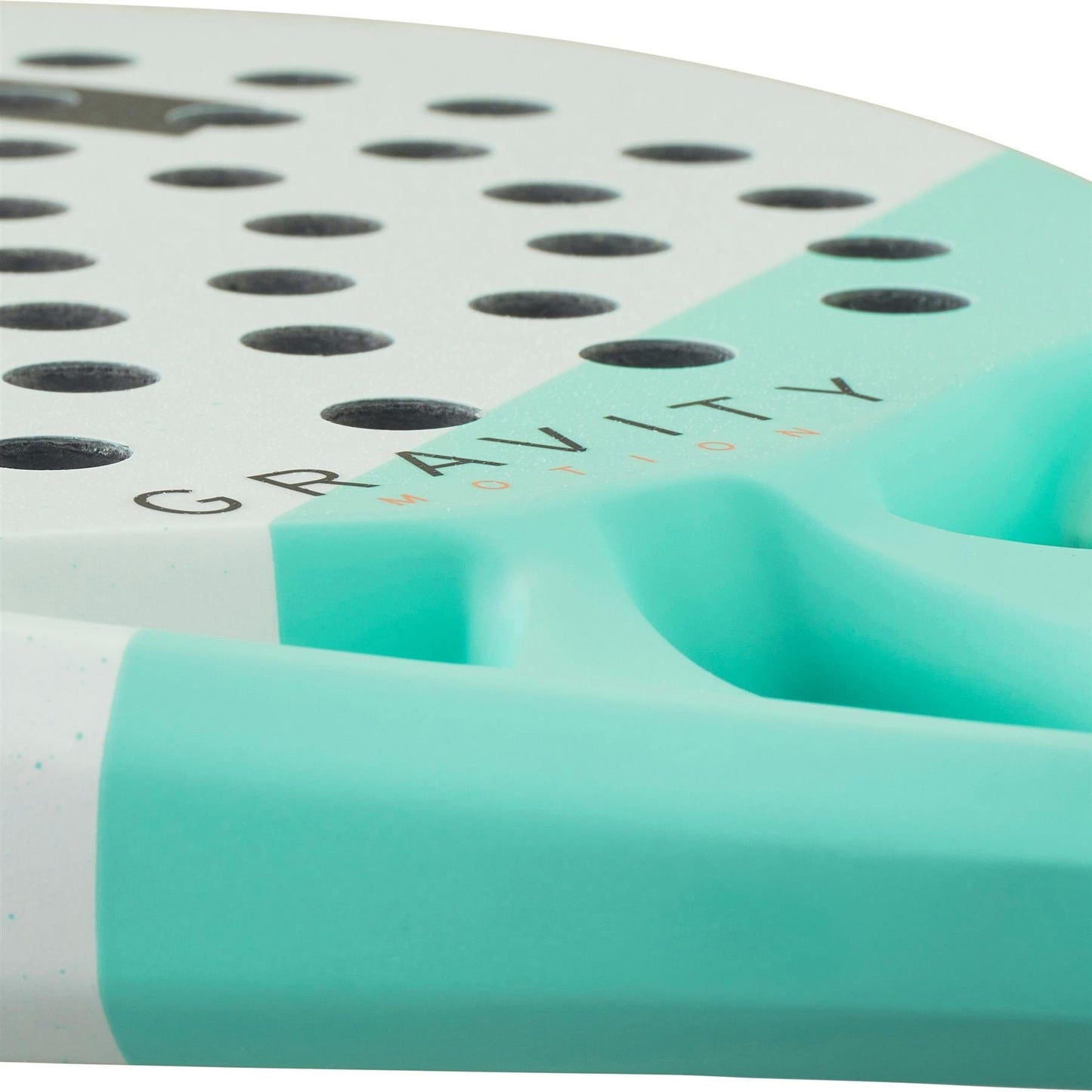 Close-up of the HEAD Gravity Motion 2024 Padel Racket in white and turquoise, featuring black holes, "GRAVITY" text on the surface, and advanced Auxetic 2.0 technology.