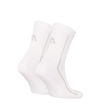 A pair of white HEAD Performance Short Crew Padel Socks (2 Pack) with a subtle logo, ribbed texture around the ankle and foot area, and arch support for comfort is displayed against a plain white background.