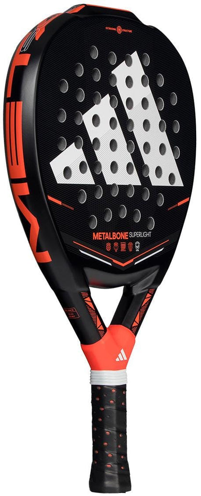 The adidas Metalbone Superlight 2026 Padel Racket is lightweight, black and red, with a large white adidas logo, a textured perforated face, and a handle wrapped in black and white grip tape.