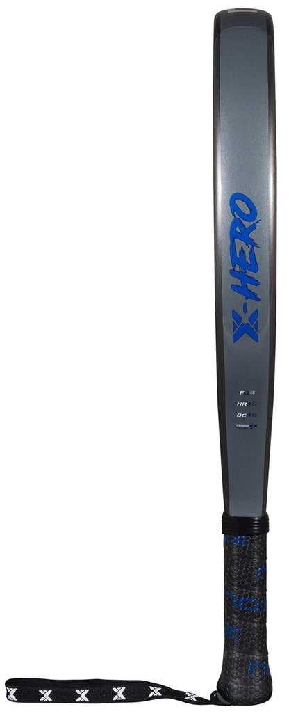 The NOX X-Hero Blue Padel Racket features a gray and black design, "X-HERO" in blue on the blade, a black grip, and a wrist strap with a white "X" pattern—perfect for beginners who want control and precision.
