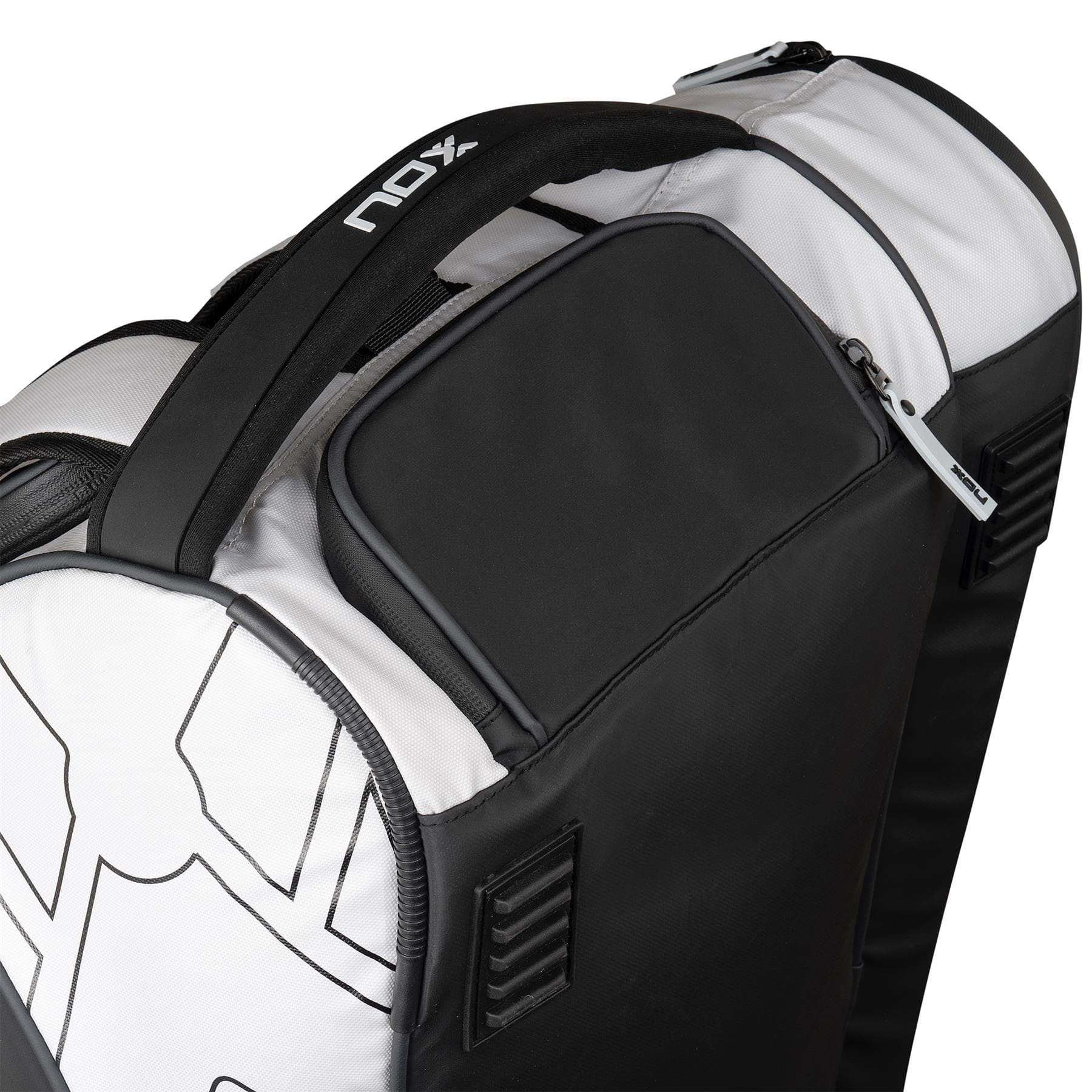 Close-up of the NOX Luxury Master Series Padel Racket Bag in black and white, featuring a zippered pocket, padded handle, and "NOX" logo on the strap—an ideal pick for fans of premium NOX gear.