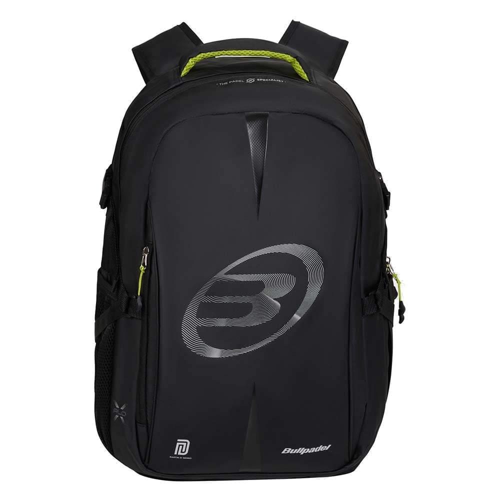 The Bullpadel BPM26022 XPLO Padel Backpack - Black features padded straps, side pockets, and green zipper pulls. Inspired by Martín Di Nenno, it displays a bold "B" logo and "Bullpadel" branding on the front.