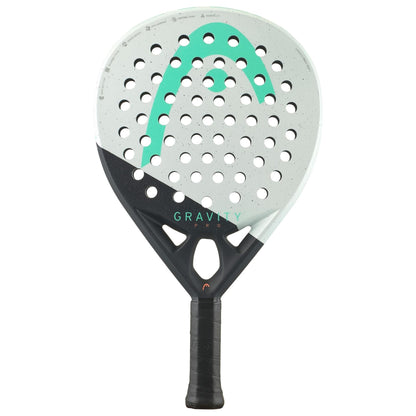 The HEAD Gravity Pro 2024 Padel Racket features a black and white split design with teal accents, circular holes, Spin Surface technology for control, and a black grip. "GRAVITY" is printed on the racket. Brand: HEAD.