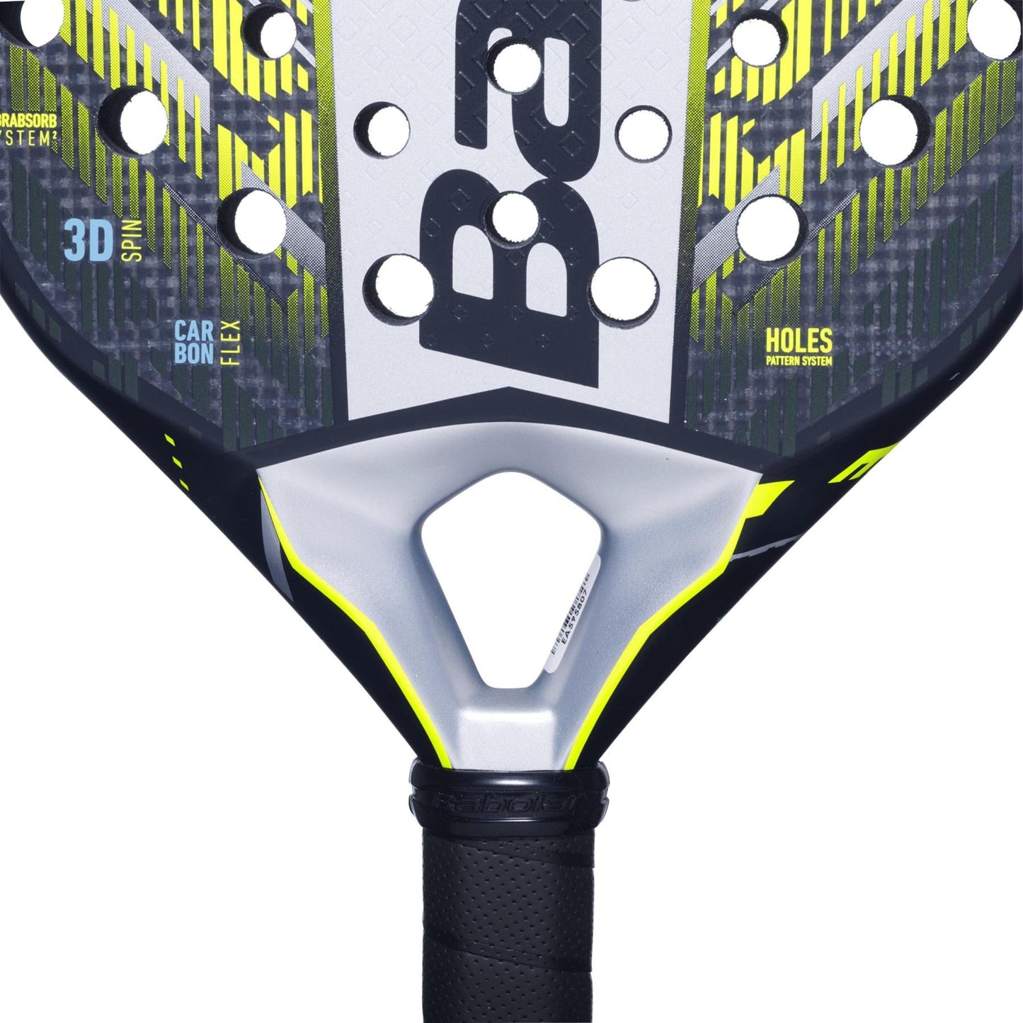 Close-up of the Babolat Counter Veron 2.5 Padel Racket head, featuring a black, gray, and yellow design with holes and Carbon Flex technology. The black handle has a textured grip and displays the “Babolat” brand name.