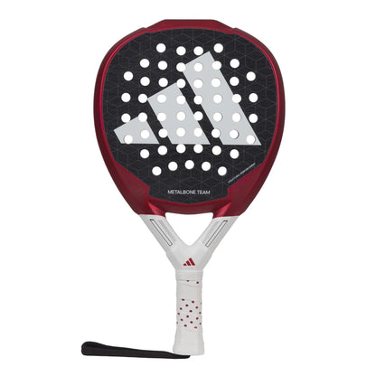 The adidas Metalbone Team 3.3 Padel Racket is red and black with a white handle, features the adidas logo in white on the face, includes Spin Blade Grit technology, and has a black wrist strap attached to the handle.