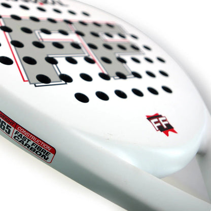 Close-up of the Karakal FF 365 Padel Racket by Karakal—an intermediate padel racket featuring black circular holes, a large "FF" logo, and bold red and black "FAST FIBER CARBON" text. Designed for spin and control.