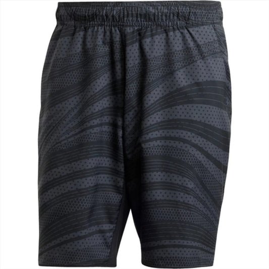 These ADIDAS Club Graphic Men's Padel Shorts are black, featuring a light gray wavy, dotted pattern on an elastic waistband. Made from recycled materials by adidas, they are lightweight and ideal for sports or casual wear.