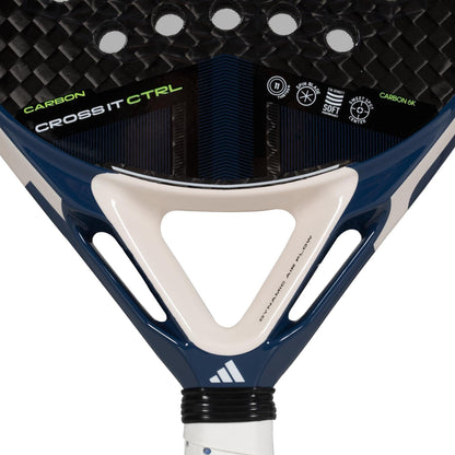 Close-up of an adidas Cross It Carbon CTRL Padel Racket, highlighting its carbon fibre texture, adidas logos, "CROSS IT CTRL" text, and part of the handle with white grip tape.