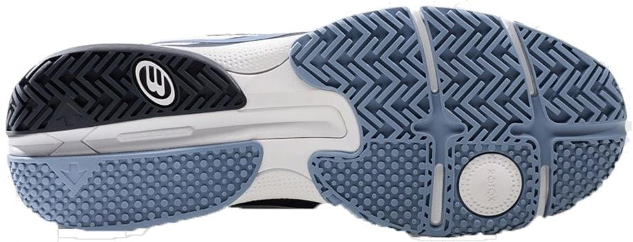 The image shows the sole of Bullpadel Hybrid Fly 26V Men's Padel Shoes in white, featuring a grippy hybrid blue and black outsole, a white midsection, and a logo near the heel—perfect for lightweight court performance.