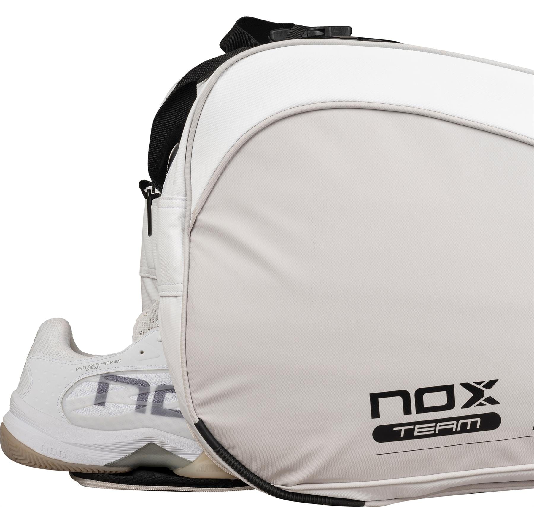 The NOX ML10 Team Padel Racket Bag - White / Grey stands upright with a matching white athletic shoe beside it, featuring a black shoulder strap and prominent NOX branding.