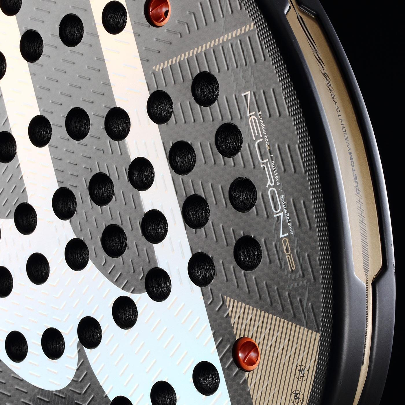 Close-up of the Bullpadel Neuron 02 2026 Padel Racket face shows its textured surface, circular holes, visible Bullpadel branding, and black and gold edge with the model name.