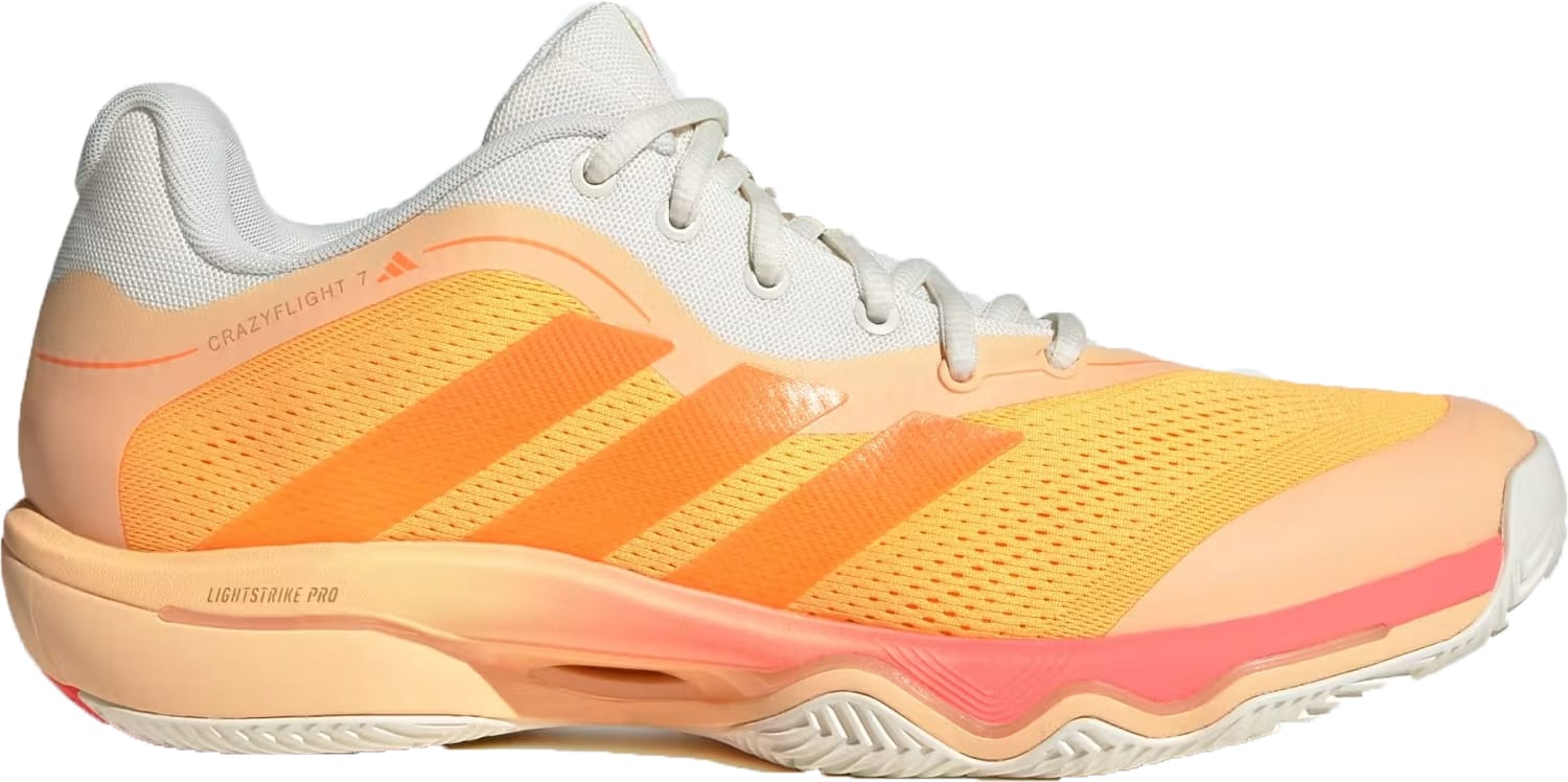 The adidas Crazyflight 7 Indoor Mens Padel Shoes in Lucid Tangerine/Lucid Orange/Off White feature mesh panels, three orange stripes, LightstrikePro cushioning, a textured sole, white laces, and a low-top design—perfect for padel.