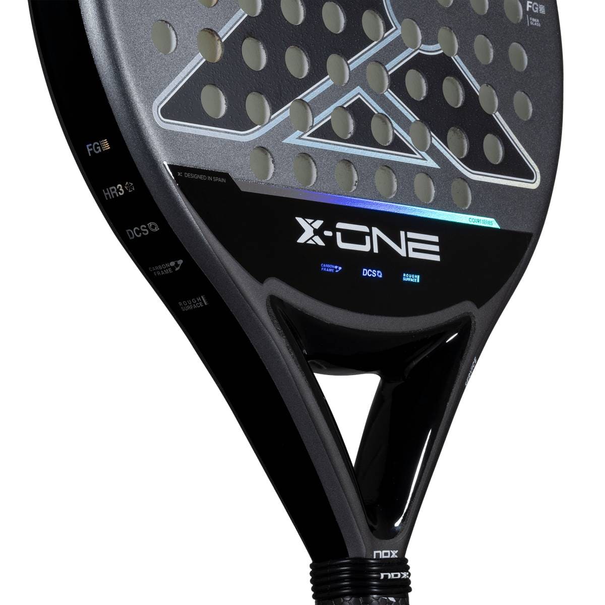 Close-up of the NOX X-One 2026 Padel Racket in black, designed for control and ideal for beginners, featuring a perforated geometric face and visible “X-One” branding with technical specs on the side and throat.